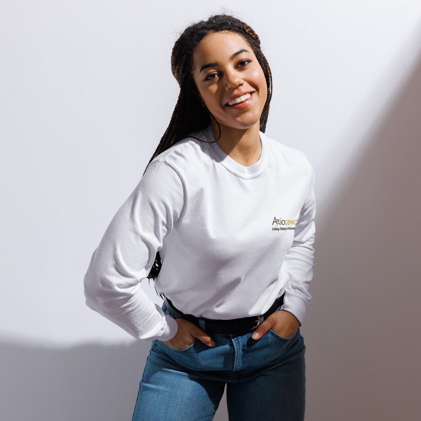 Heavyweight white long-sleeve shirt with embroidered logo and tagline